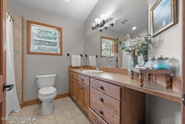 106 Stewart Dr, Blanchard, ID 83804 - bathroom featuring tile patterned flooring, vanity, toilet, a shower with curtain, and baseboards