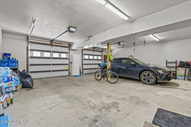 106 Stewart Dr, Blanchard, ID 83804 - garage featuring a garage door opener