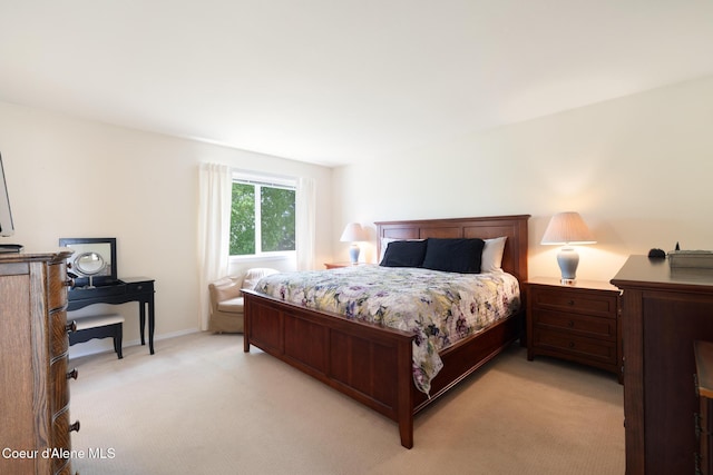 4950 E Frazier Dr, Post Falls, ID 83854 - bedroom with light colored carpet and baseboards
