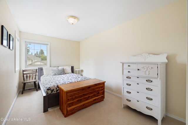 4950 E Frazier Dr, Post Falls, ID 83854 - bedroom featuring light carpet and baseboards