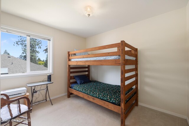 4950 E Frazier Dr, Post Falls, ID 83854 - bedroom featuring light carpet and baseboards