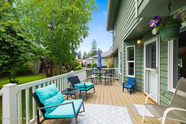 4950 E Frazier Dr, Post Falls, ID 83854 - wooden terrace featuring outdoor dining area
