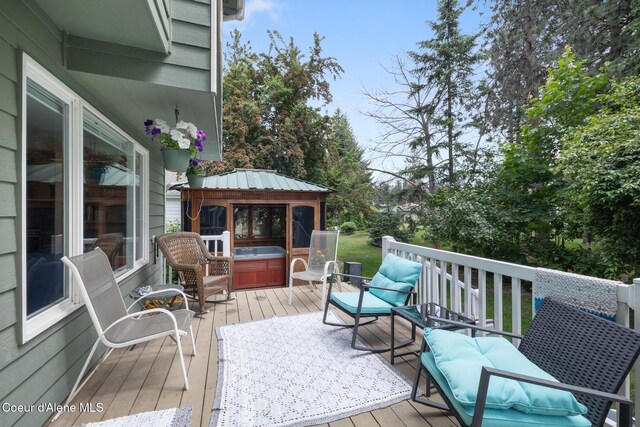 4950 E Frazier Dr, Post Falls, ID 83854 - wooden deck with a hot tub