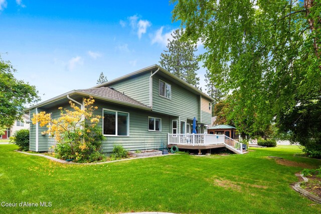 4950 E Frazier Dr, Post Falls, ID 83854 - back of property featuring a deck, a yard, and a gazebo