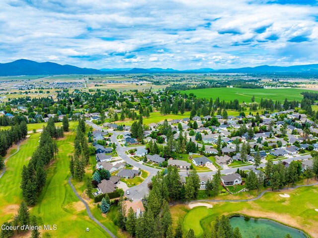 4950 E Frazier Dr, Post Falls, ID 83854 - aerial view of residential area with a mountainous background and a golf course