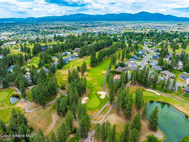 4950 E Frazier Dr, Post Falls, ID 83854 - aerial perspective of suburban area featuring a golf course and a water and mountain view