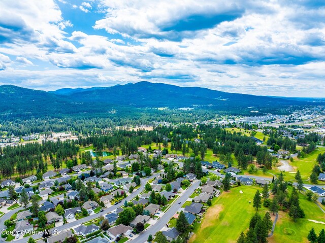4950 E Frazier Dr, Post Falls, ID 83854 - aerial view of residential area with a golf course and a water and mountain view