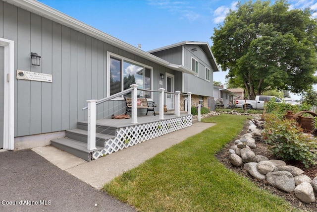 9670 N Meadow Way, Hayden, ID 83835 - view of exterior entry featuring a yard