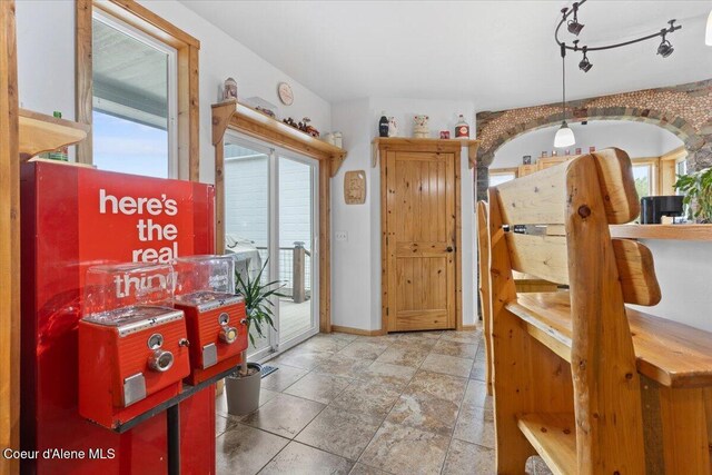 9670 N Meadow Way, Hayden, ID 83835 - entryway featuring healthy amount of natural light and baseboards