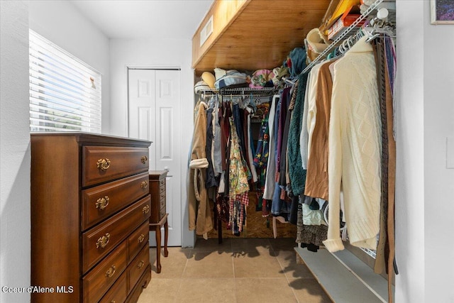 9670 N Meadow Way, Hayden, ID 83835 - walk in closet featuring light tile patterned flooring