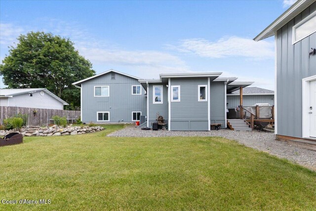 9670 N Meadow Way, Hayden, ID 83835 - back of house featuring a deck