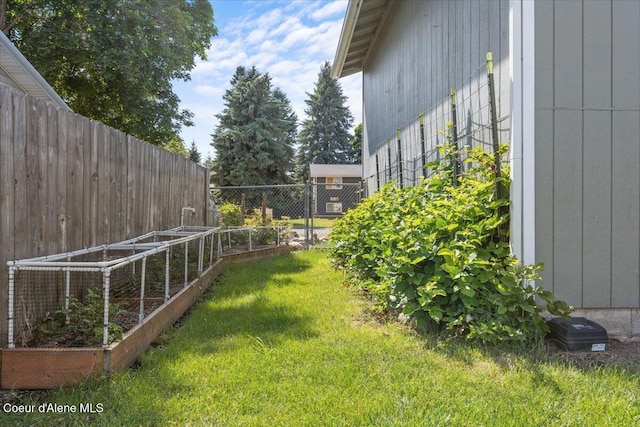 9670 N Meadow Way, Hayden, ID 83835 - view of yard featuring a vegetable garden