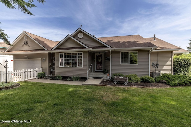 8846 N Clarkview Pl, Hayden, ID 83835 - ranch-style home featuring an attached garage and a shingled roof