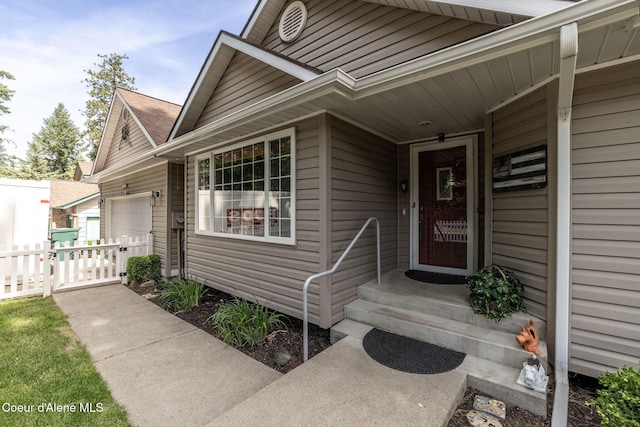 8846 N Clarkview Pl, Hayden, ID 83835 - doorway to property with a garage