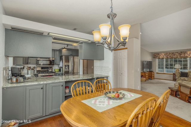 8846 N Clarkview Pl, Hayden, ID 83835 - dining space with a chandelier
