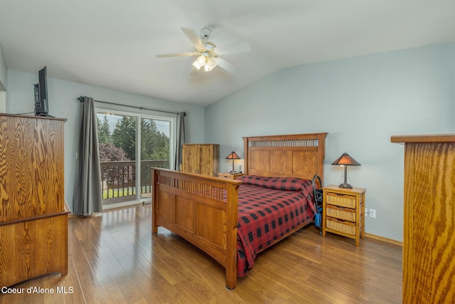 8846 N Clarkview Pl, Hayden, ID 83835 - bedroom featuring wood finished floors, vaulted ceiling, and ceiling fan