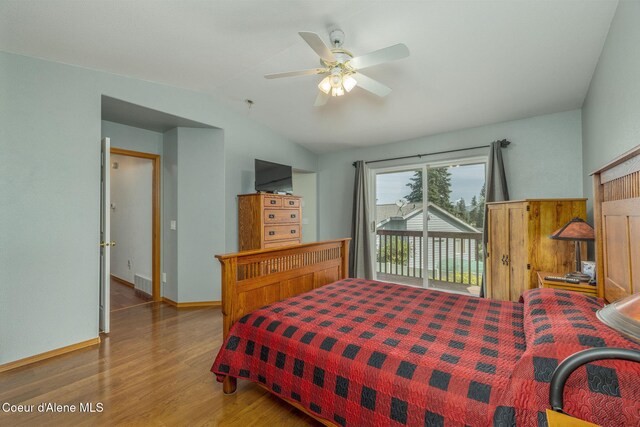 8846 N Clarkview Pl, Hayden, ID 83835 - bedroom featuring access to exterior, wood finished floors, lofted ceiling, and ceiling fan