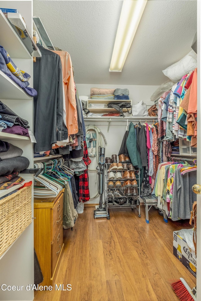 8846 N Clarkview Pl, Hayden, ID 83835 - spacious closet with wood finished floors