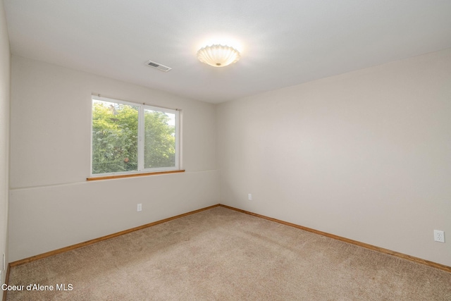 8846 N Clarkview Pl, Hayden, ID 83835 - carpeted empty room featuring baseboards