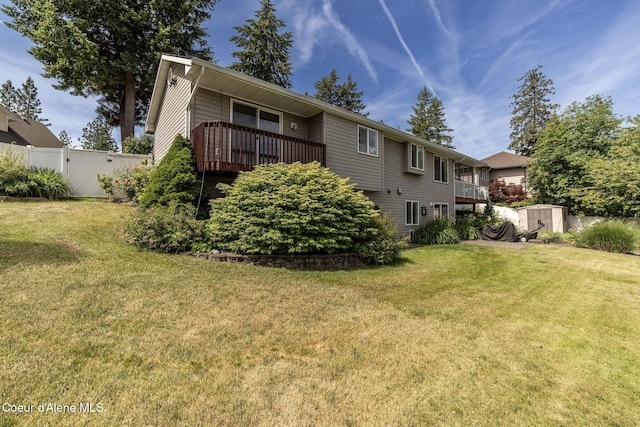 8846 N Clarkview Pl, Hayden, ID 83835 - back of house featuring a storage shed, a gate, and a balcony