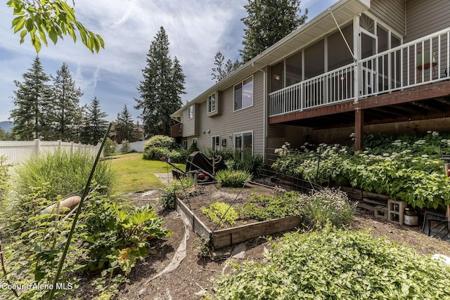 8846 N Clarkview Pl, Hayden, ID 83835 - view of yard featuring a garden and a sunroom