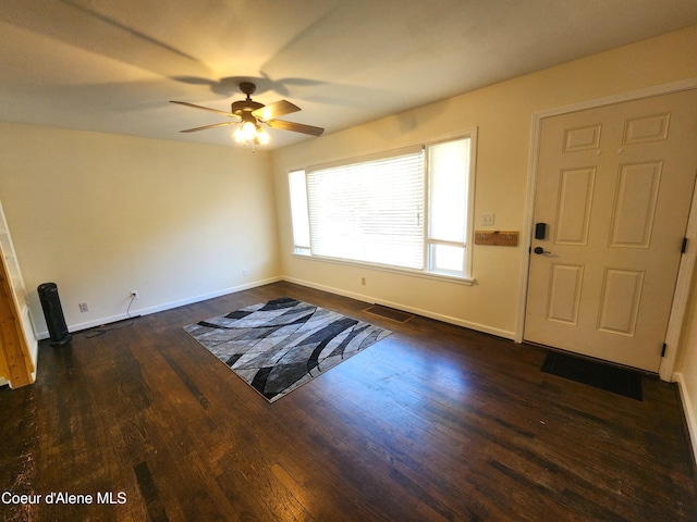 607 W Riverside Ave, Kellogg, ID 83837 - foyer entrance with a ceiling fan, dark wood-type flooring, and baseboards