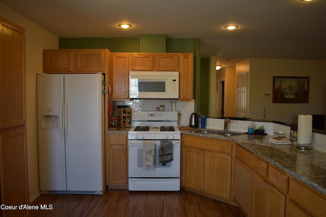 1406 Walnut, Sandpoint, ID 83864 - kitchen with white appliances, a sink, dark wood-style floors, tasteful backsplash, and stone countertops