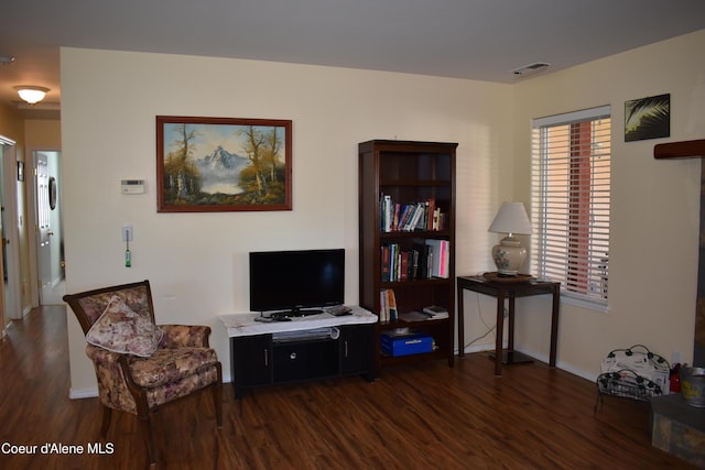 1406 Walnut, Sandpoint, ID 83864 - living area featuring dark wood-style floors and baseboards