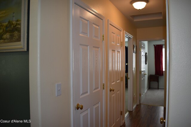 1406 Walnut, Sandpoint, ID 83864 - corridor featuring dark wood-style flooring and baseboards