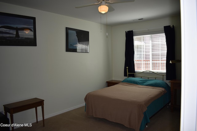 1406 Walnut, Sandpoint, ID 83864 - bedroom featuring baseboards, ceiling fan, and carpet
