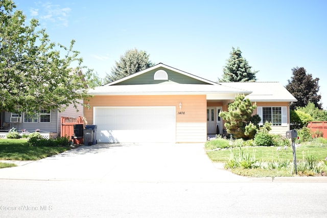 1406 Walnut, Sandpoint, ID 83864 - ranch-style home featuring an attached garage and driveway