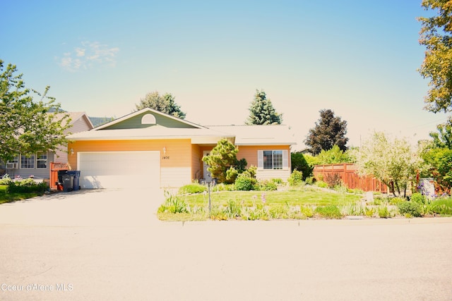 1406 Walnut, Sandpoint, ID 83864 - ranch-style home featuring an attached garage and driveway