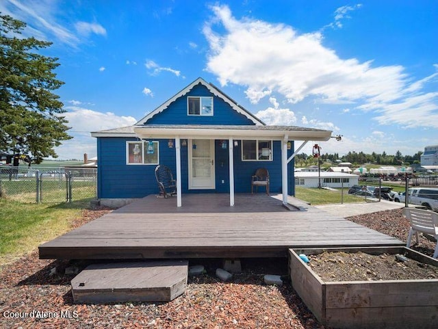 409 N 2nd St, Fairfield, WA 99012 - rear view of house featuring a garden