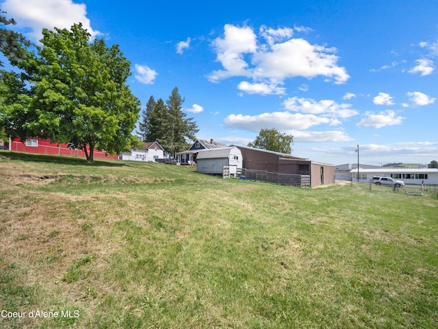 409 N 2nd St, Fairfield, WA 99012 - view of green lawn with an outbuilding and an outdoor structure