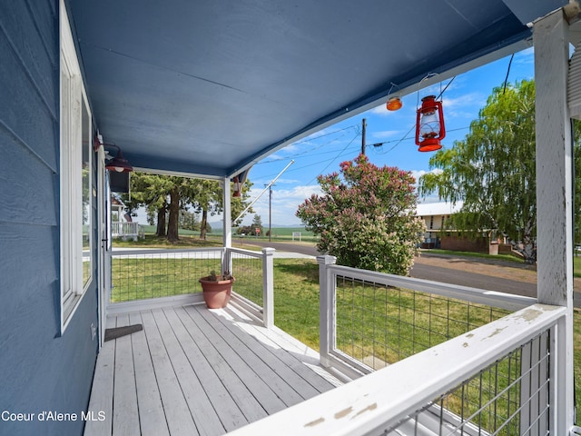 409 N 2nd St, Fairfield, WA 99012 - wooden porch with a yard