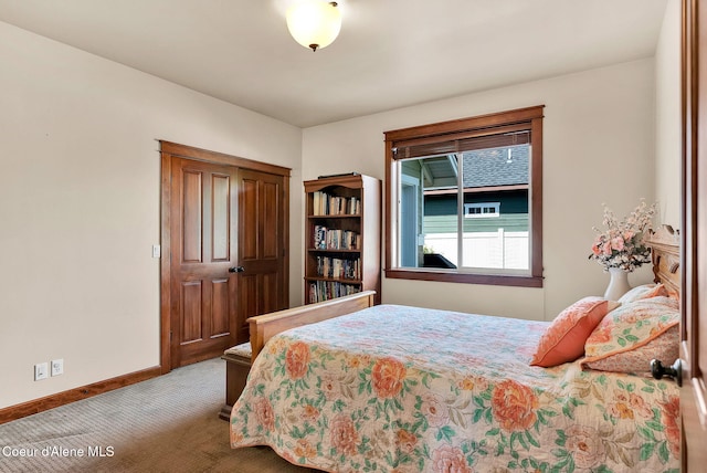 14774 N Pristine Cir, Rathdrum, ID 83858 - carpeted bedroom featuring baseboards and a closet