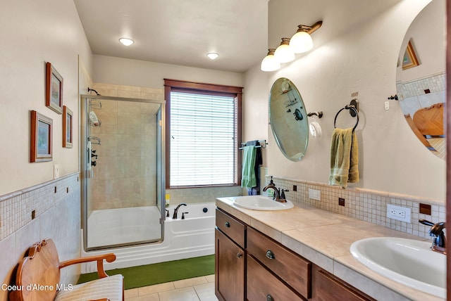 14774 N Pristine Cir, Rathdrum, ID 83858 - full bathroom featuring a stall shower, a bath, tile patterned floors, and double vanity