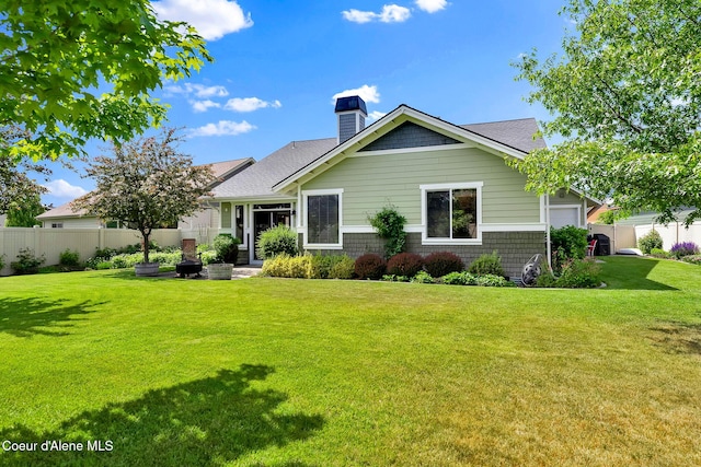 14774 N Pristine Cir, Rathdrum, ID 83858 - back of house with a chimney and a shingled roof