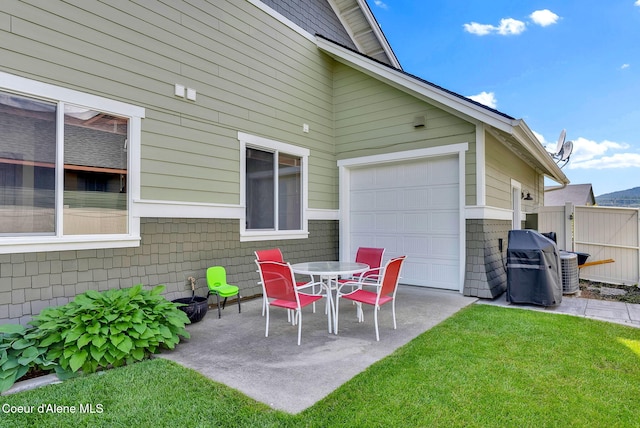 14774 N Pristine Cir, Rathdrum, ID 83858 - view of patio featuring a garage