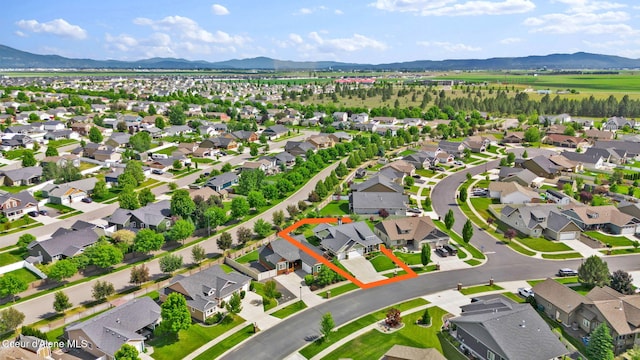 14774 N Pristine Cir, Rathdrum, ID 83858 - aerial overview of property's location featuring a mountainous background and nearby suburban area