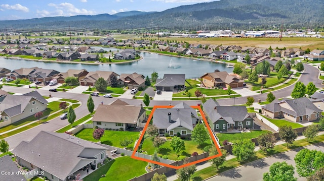 14774 N Pristine Cir, Rathdrum, ID 83858 - aerial view of residential area featuring property parcel outlined and a water and mountain view