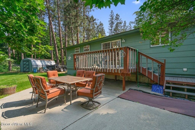 201 S Sequoia Ct, Post Falls, ID 83854 - view of patio featuring outdoor dining area and a deck