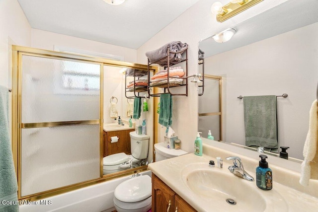 201 S Sequoia Ct, Post Falls, ID 83854 - bathroom featuring toilet, vanity, and enclosed tub / shower combo