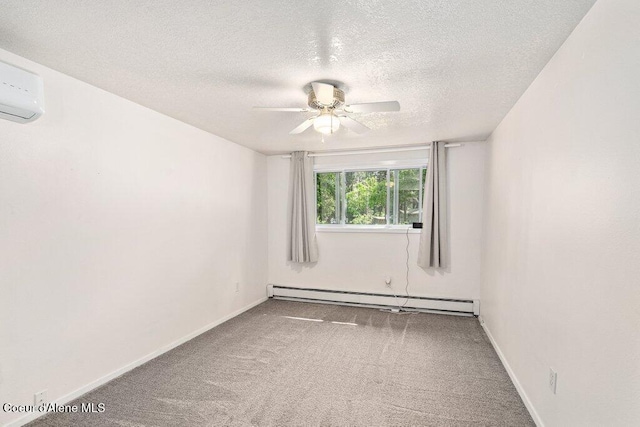 201 S Sequoia Ct, Post Falls, ID 83854 - unfurnished room featuring baseboard heating, a ceiling fan, carpet flooring, a wall mounted AC, and a textured ceiling