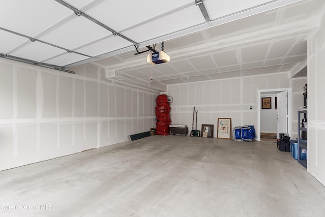 6430 N Atlas Rd Unit 101, Coeur Dalene, ID 83815 - garage featuring a garage door opener