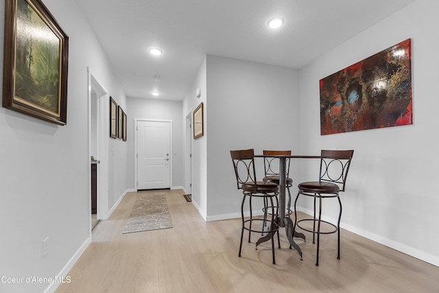 6430 N Atlas Rd Unit 101, Coeur Dalene, ID 83815 - dining space featuring light wood-style floors, recessed lighting, and baseboards