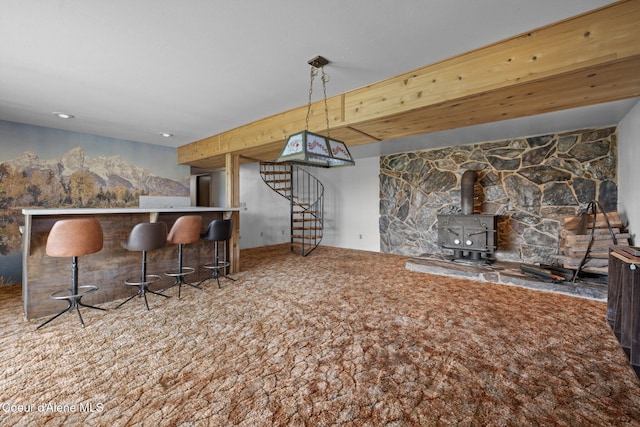 1995 Long Rd, Plummer, ID 83851 - bar featuring a wood stove, stairway, and carpet flooring