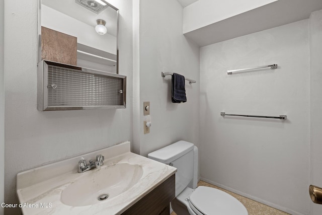 1995 Long Rd, Plummer, ID 83851 - half bath featuring toilet, vanity, and baseboards