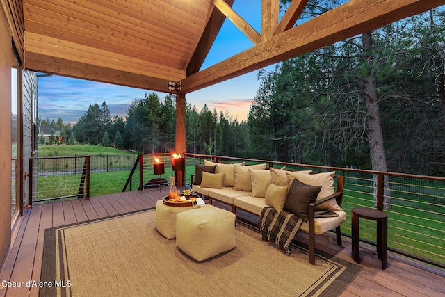 11733 N Blue Jay Loop, Hayden, ID 83835 - wooden deck with an outdoor living space and view of wooded area