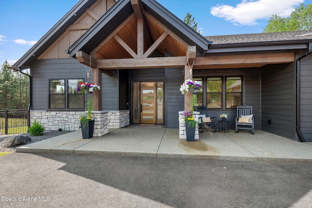 11733 N Blue Jay Loop, Hayden, ID 83835 - property entrance with stone siding and board and batten siding